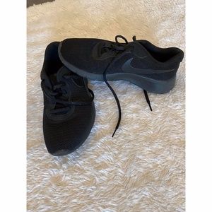 Black Nike Tennis Shoe